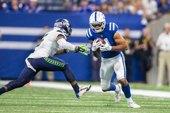 Sep 12, 2021; Indianapolis, Indiana, USA; Indianapolis Colts wide receiver Michael Pittman (11) catches the ball while Seattle Seahawks strong safety Quandre Diggs (6) defends in the second quarter at Lucas Oil Stadium. Mandatory Credit: Trevor Ruszkowski-USA TODAY Sports